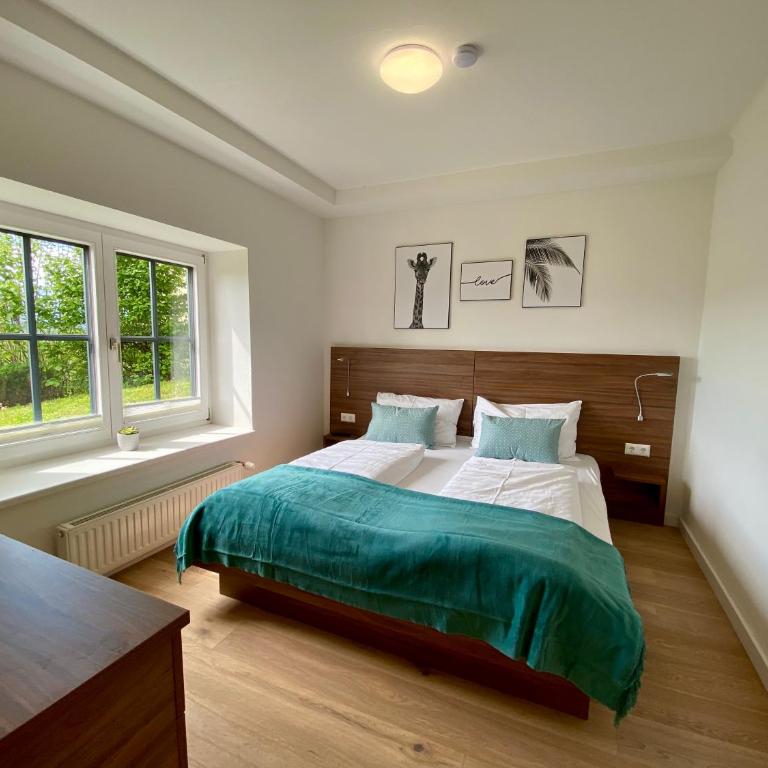 Haus Aussicht - Ferienwohnungen Velden - Apartment mit Gartenblick - 1