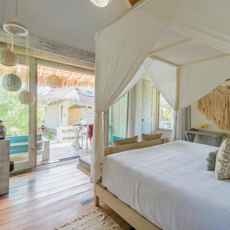 Kai Tulum - Suite con cama grande y vistas parciales al mar - 2
