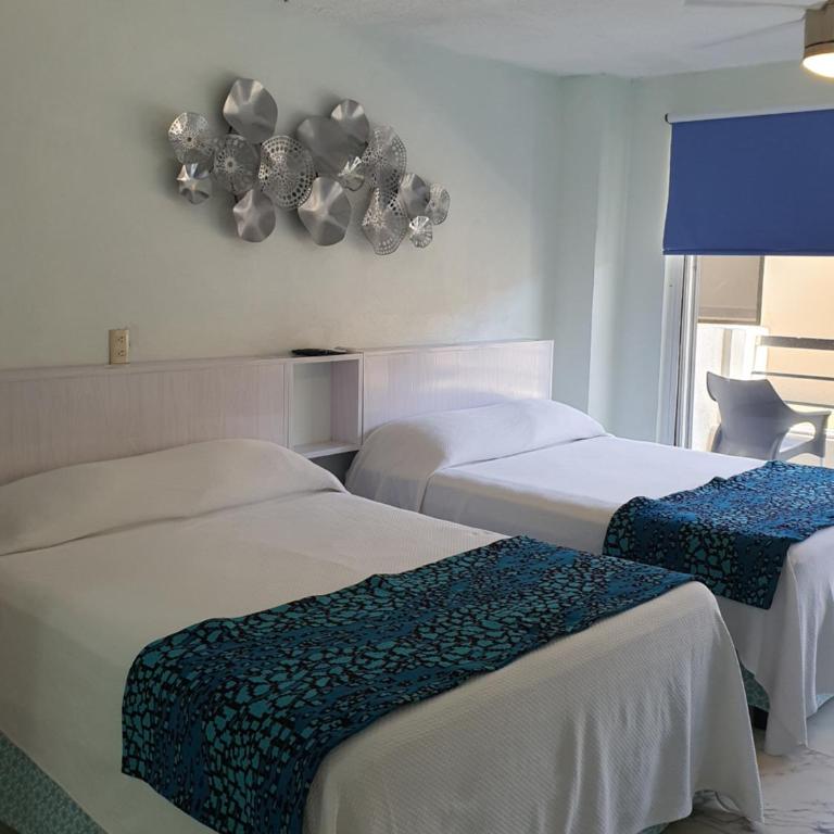 MARLIN TURQUESA DEPARTAMENTOs FRENTE AL MAR - Three-Bedroom Apartment with Water View - 21