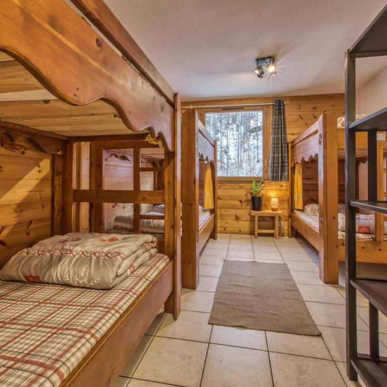 Gîte Ancolie Bleue - Ce lit simple est situé dans un dortoir. - 1