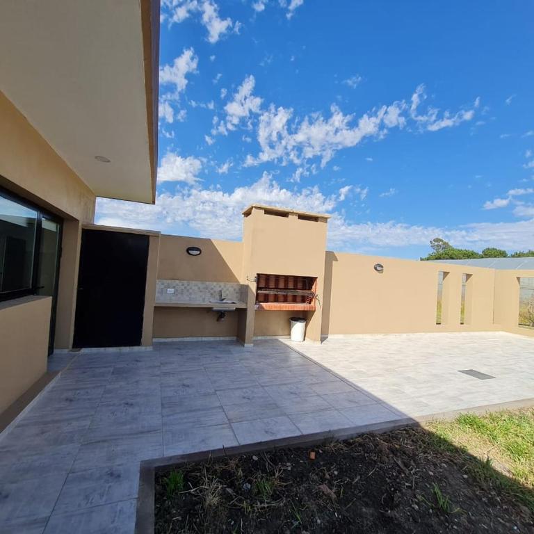 Casas en Barrio Los Teros con pileta compartida - Santa Clara del Mar - Three-Bedroom Townhouse - 37