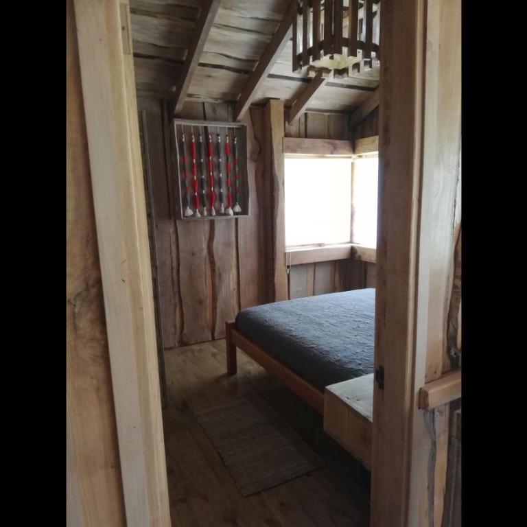 Cabana rustica 2 maravillosa,con troncos nativos, con orilla de Rio Trancura - Casa - 21