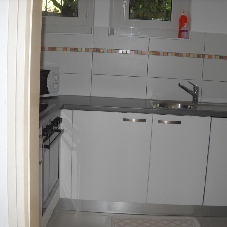 Casa Alice - Appartamento con 2 Camere da Letto e Accesso Giardino - 16