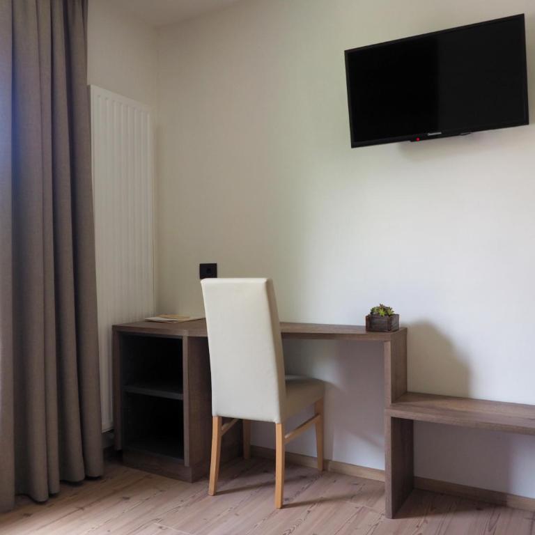 Guesthouse Rungg - Camera Tripla Superior - 2