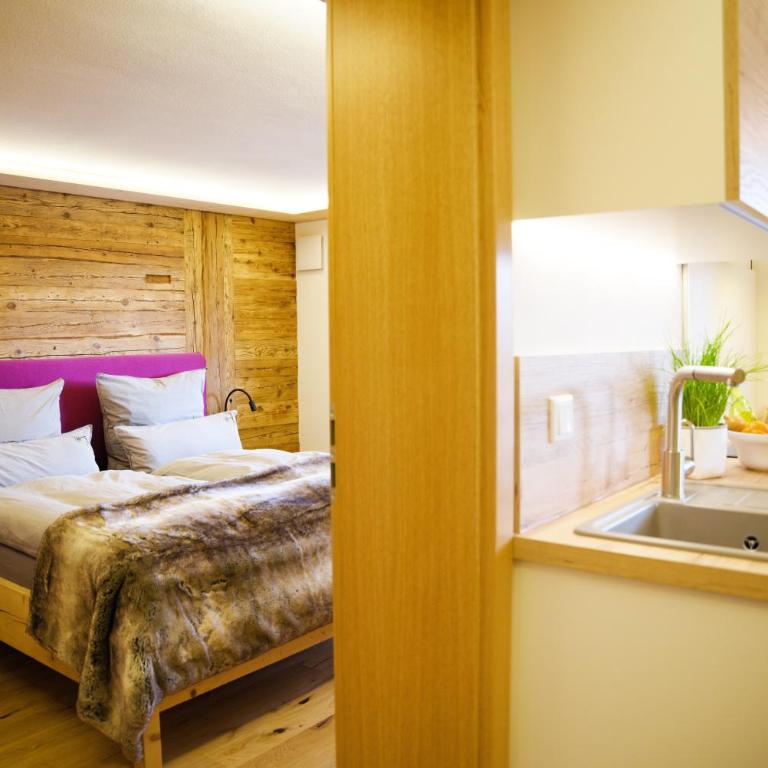 Leos Alpenchalet - inclusive Sommer Bergbahnticket und E-Auto Ladestation - Apartment mit 2 Schlafzimmern - 4
