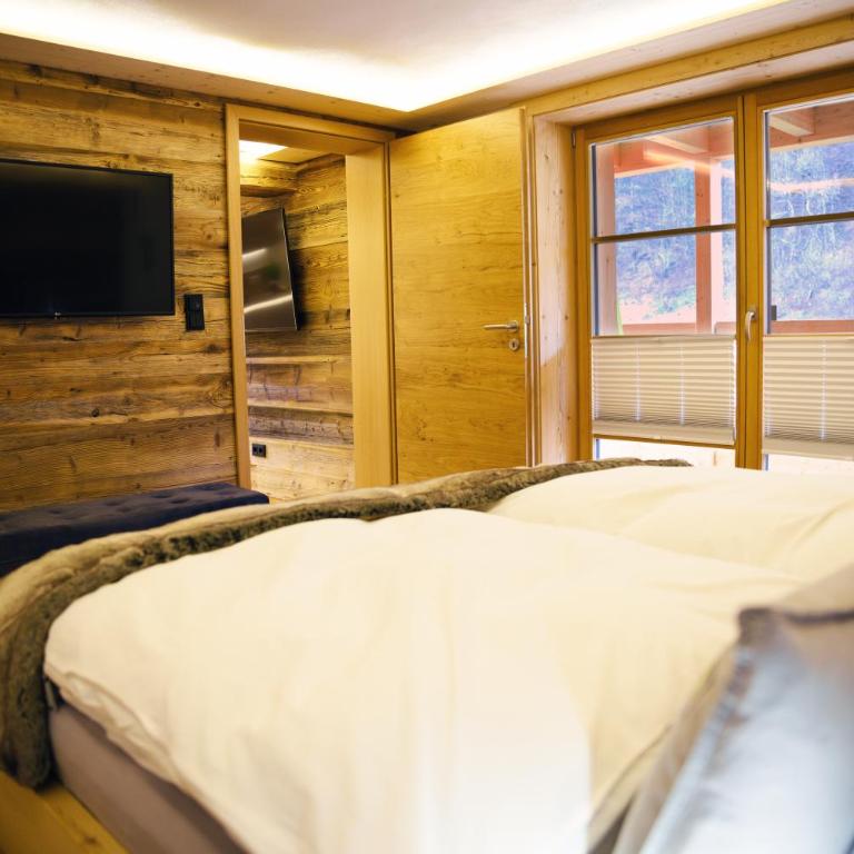 Leos Alpenchalet - inclusive Sommer Bergbahnticket und E-Auto Ladestation - Apartment mit 1 Schlafzimmer - 9