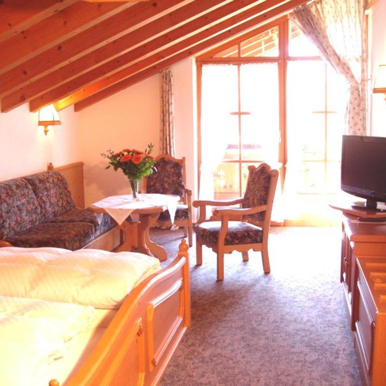 Gästehaus Schwarzlofer - Comfort Vierbettzimmer - 12