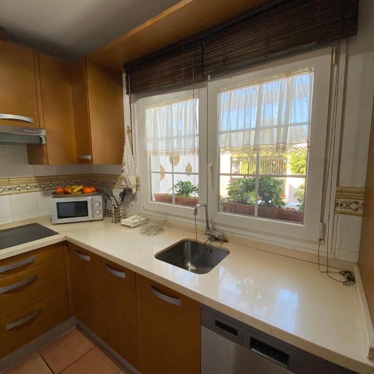 Precioso adosado rodeado de un entorno verde natural y muy cerca de la playa - Apartamento de 2 dormitorios - 25
