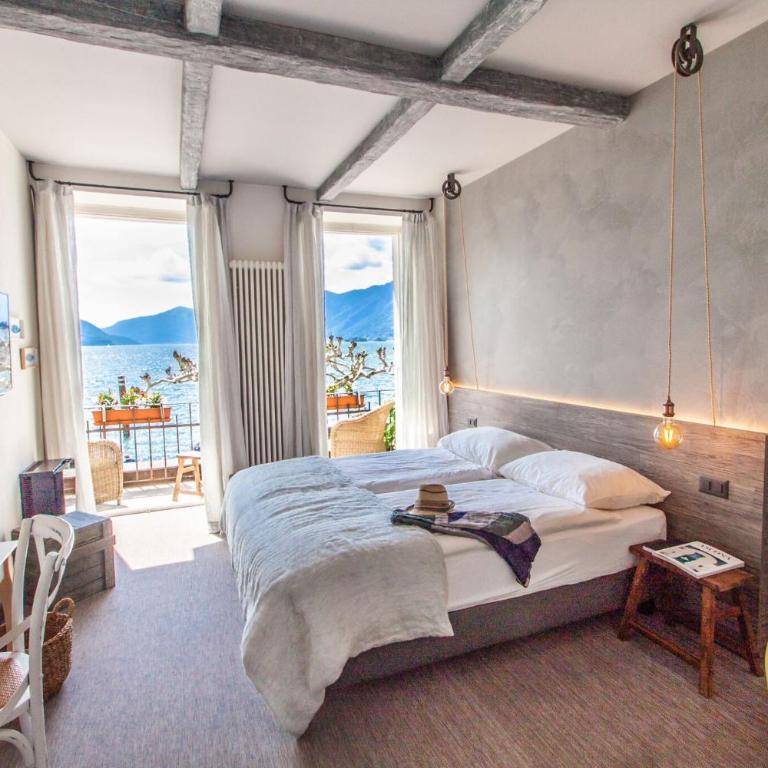 Seven Boutique Hotel - Camera Matrimoniale con Vista Lago e Balcone - 1