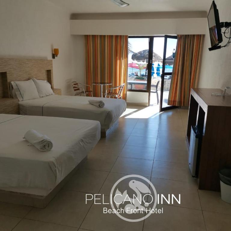 Pelicano Inn Playa del Carmen - Beachfront Hotel - Deluxe Double Room with Two Double Beds - Oceanfront - 2