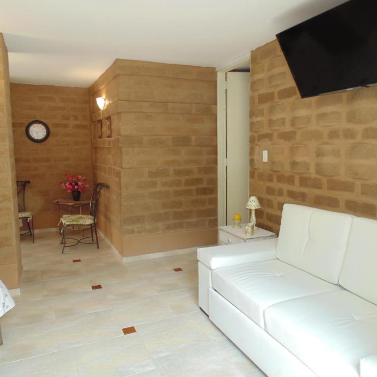 Bella Tierra Hotel Boutique - Suite con cama grande - 4
