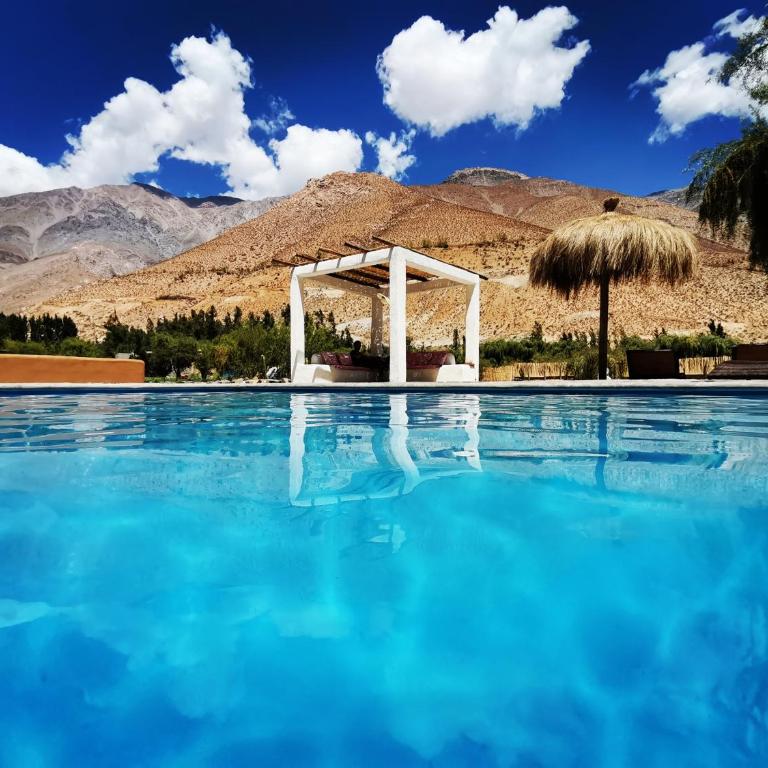 Reset Elqui - Habitación con cama extragrande y vistas a la montaña - 25