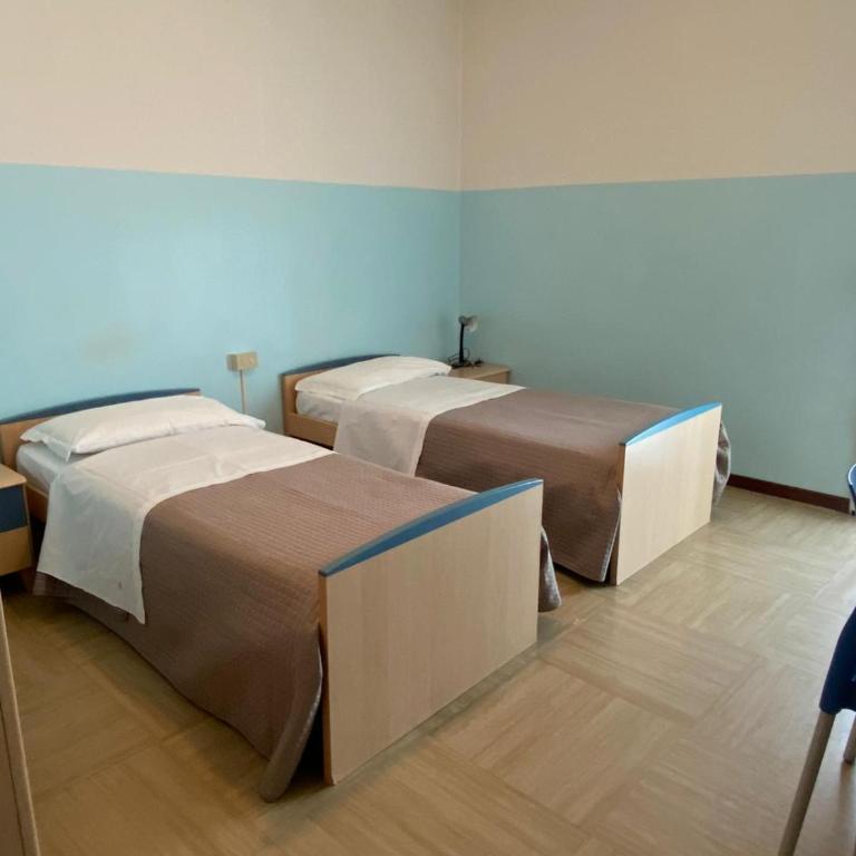 Casa Vacanze Paolo VI - Camera Doppia con Letti Singoli con Bagno Privato - 2