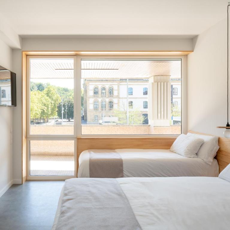 Cristina Enea Rooms - Habitación Doble Superior con vistas a la ciudad - 1