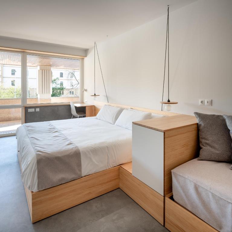 Cristina Enea Rooms - Habitación Deluxe con vistas a la ciudad. - 1