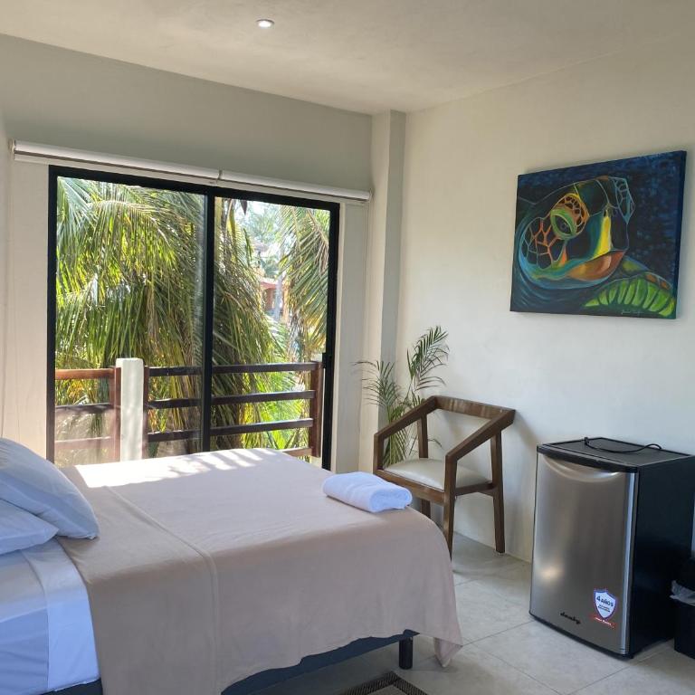 Cuxos Hotel Beachfront - Quadruple Room with Sea View - 7
