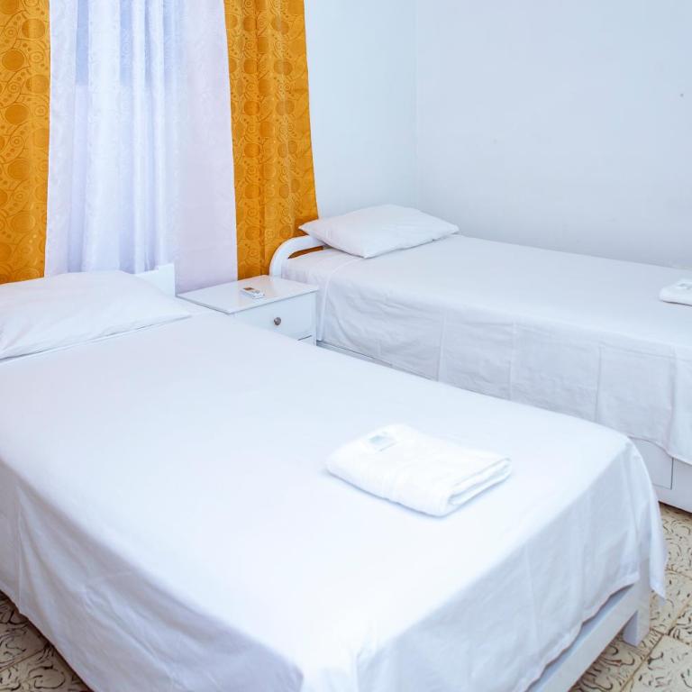 Aqui me quedo - Habitación Doble Económica - 2 camas - 4