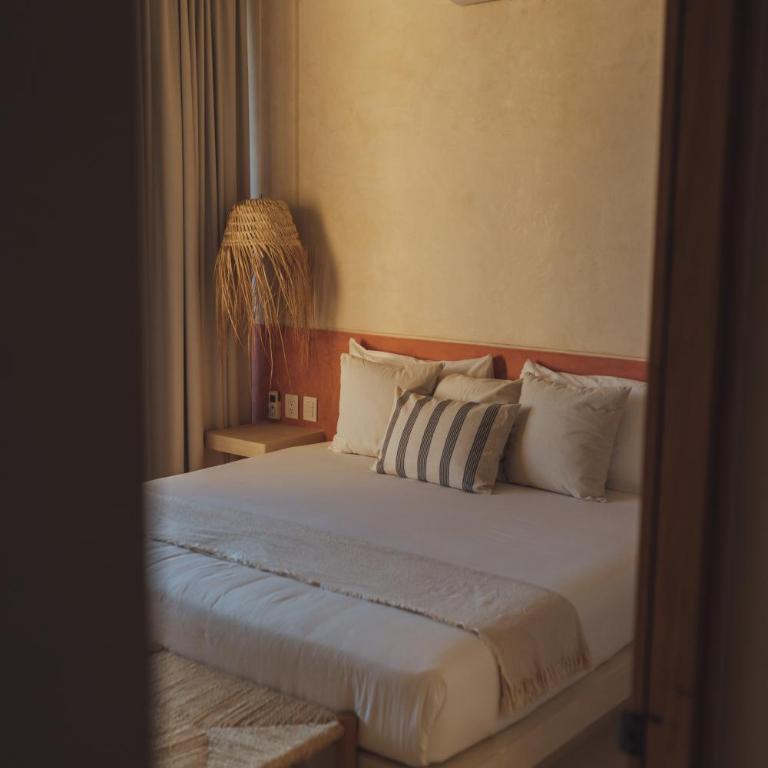 Casa Peregrino Holbox - Suite con cama grande y balcón - 12