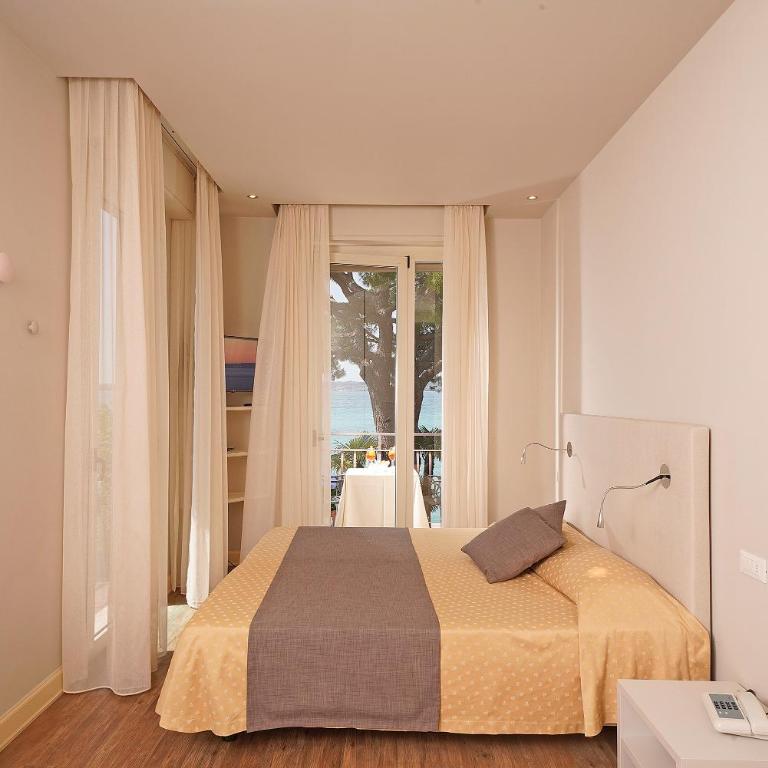 Hotel Marconi - Camera Superior Matrimoniale/Doppia con Letti Singoli con Vista Lago - 4