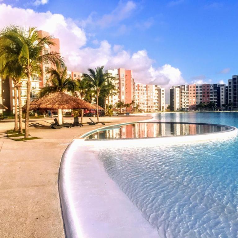 Escape al Caribe con una vista impresionante en Pilarita's Dream Lagoons - Three-Bedroom Apartment - 13