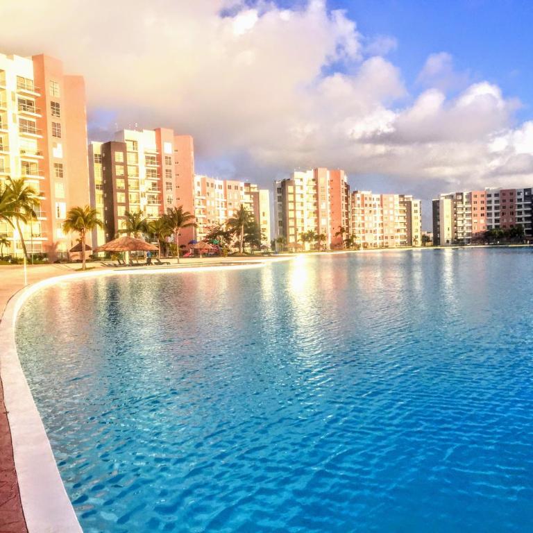 Escape al Caribe con una vista impresionante en Pilarita's Dream Lagoons - Three-Bedroom Apartment - 38