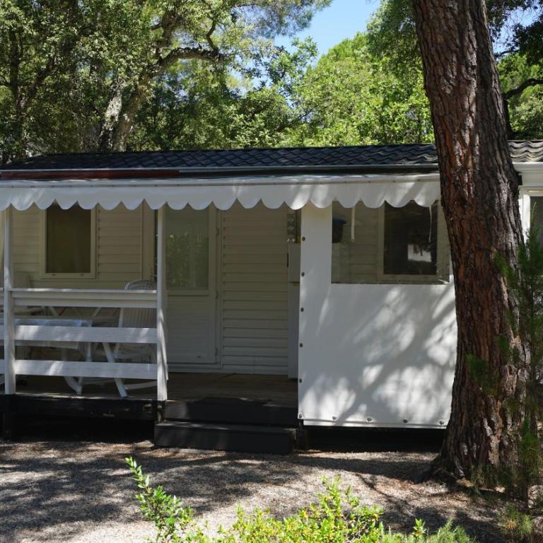 Chalets with kitchen outside at Camping Leï Suves - JoyCasa - Mobile Home - 7
