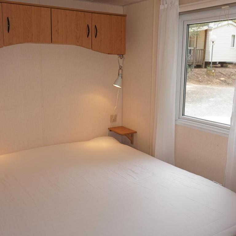 Chalets with kitchen outside at Camping Leï Suves - JoyCasa - Chalet - 1