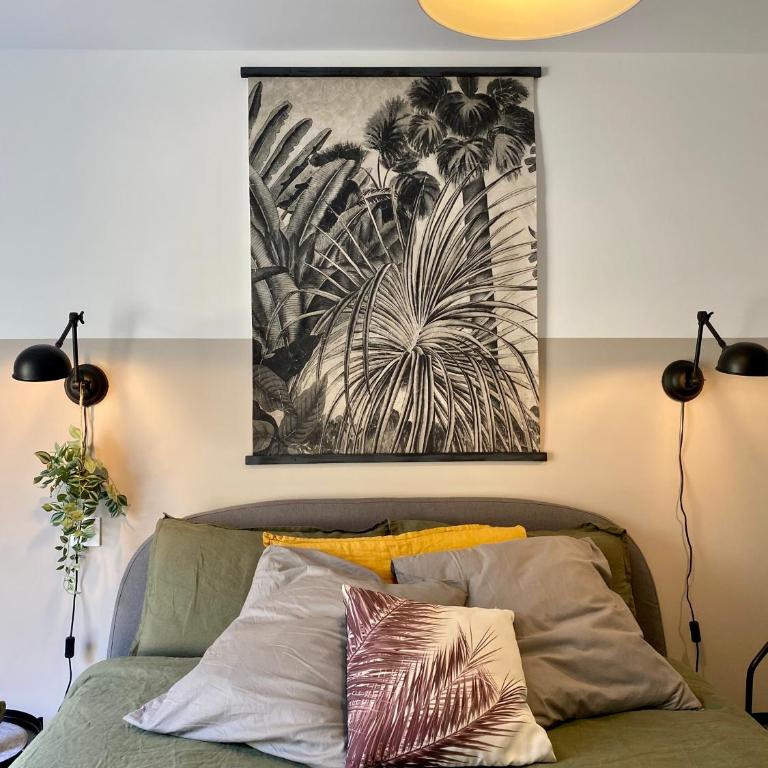 NOUVEAU - Jungle Montpeul - Clim - Wifi fibre - Netflix - 5' du centre et gare - Parking - Loggia - 15' des plages - Two-Bedroom Apartment - 11