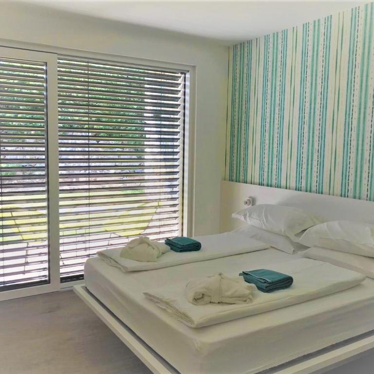 Elle Ecoholiday - Junior Suite con Vista Giardino - 7