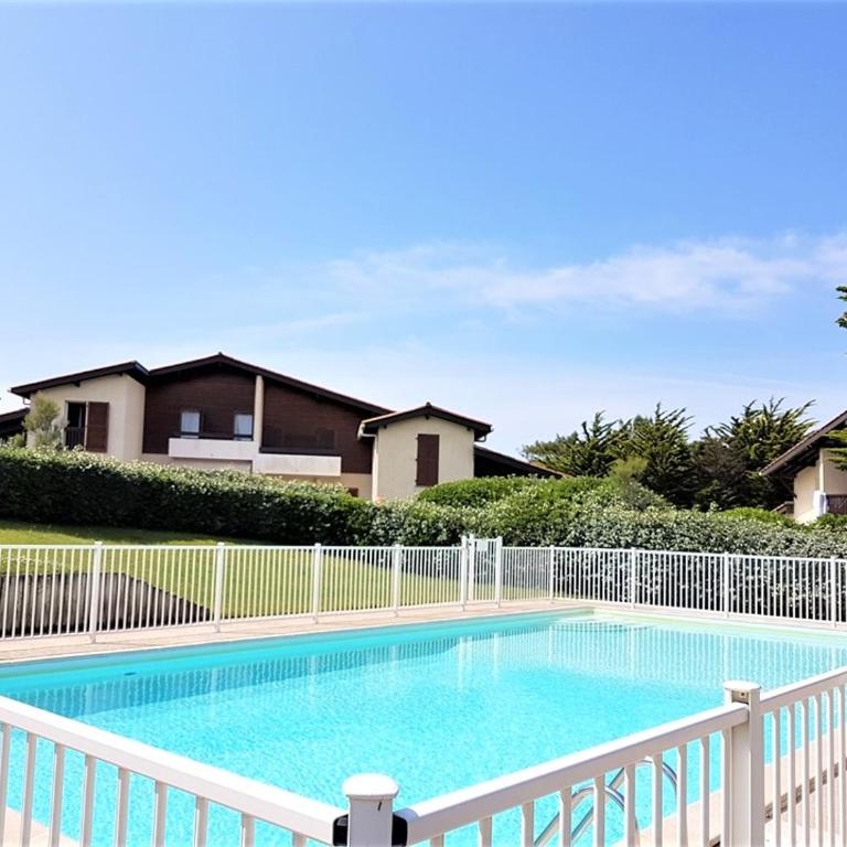 Réf 263, Seignosse océan, Villa Patio classée 3 étoiles avec Wifi à 150m de la plage, en bordure de forêt avec place de parking et piscine commune - One-Bedroom Villa - 21
