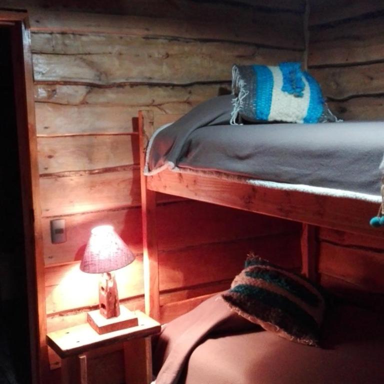 Cabaa rstica 2 maravillosa,con troncos nativos, con orilla de Ro Trancura - Vacation Home - 8