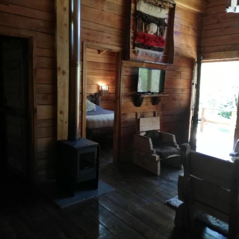 Cabaa rstica 2 maravillosa,con troncos nativos, con orilla de Ro Trancura - Vacation Home - 30
