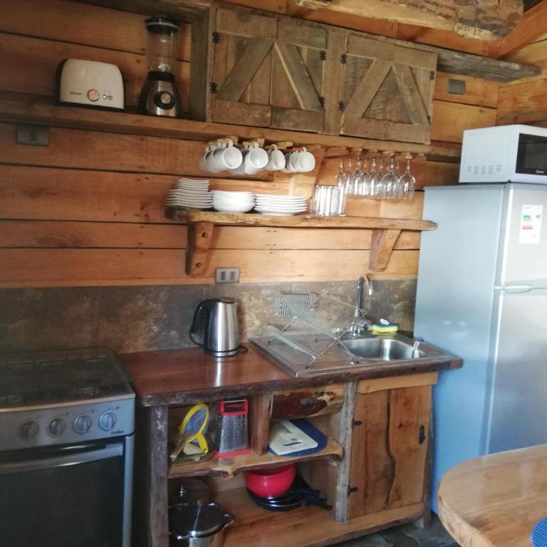 Cabaa rstica 2 maravillosa,con troncos nativos, con orilla de Ro Trancura - Vacation Home - 36