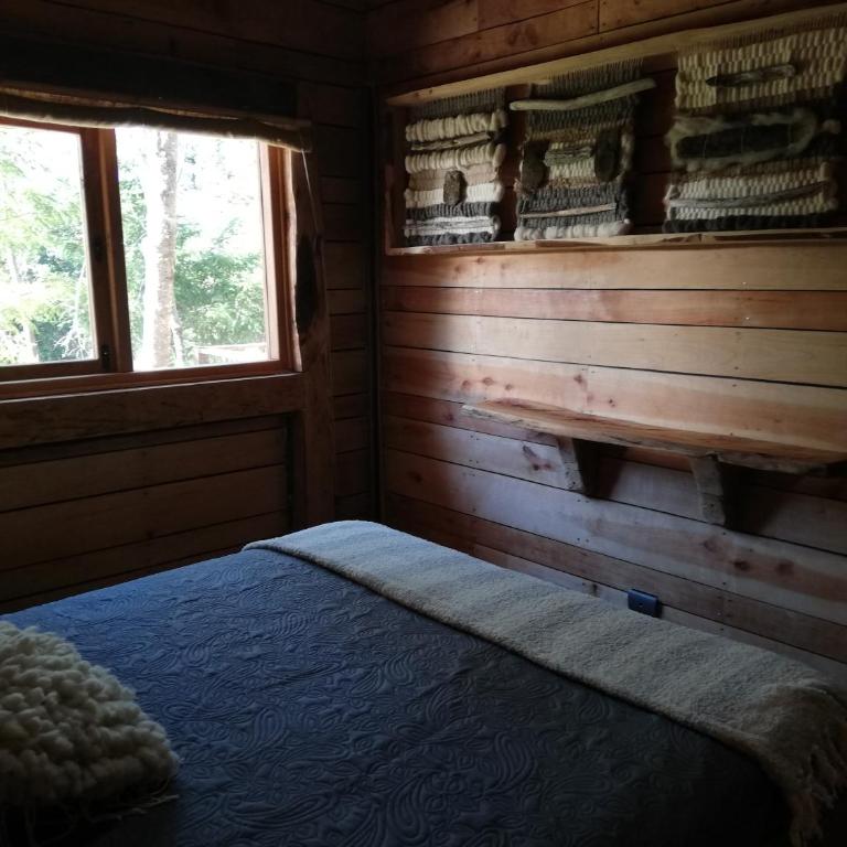 Cabaa rstica 2 maravillosa,con troncos nativos, con orilla de Ro Trancura - Vacation Home - 39