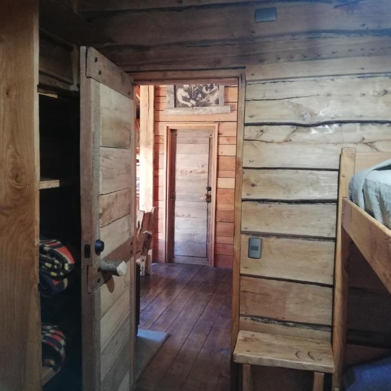 Cabaa rstica 2 maravillosa,con troncos nativos, con orilla de Ro Trancura - Vacation Home - 40