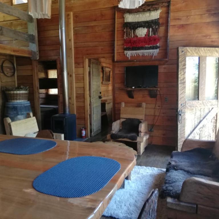 Cabaa rstica 2 maravillosa,con troncos nativos, con orilla de Ro Trancura - Vacation Home - 41