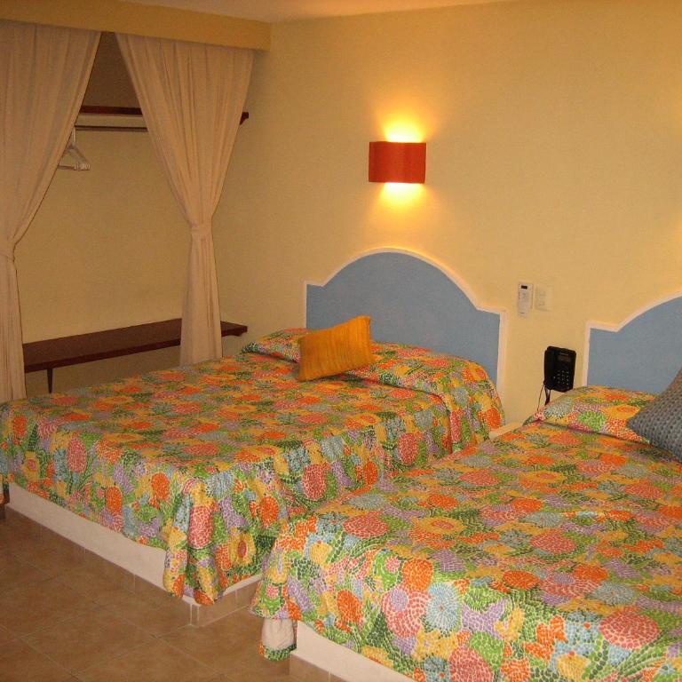 Hotel Delfines Acapulco by NG Hoteles - Habitación Doble Superior - 2 camas dobles - 3