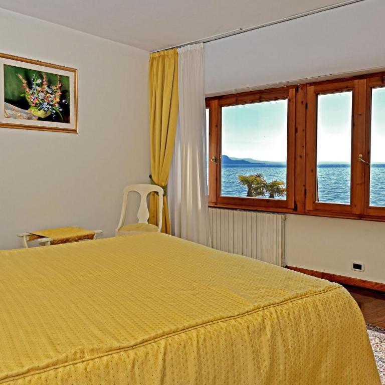 Camere Al Veliero - Camera Quadrupla con Vista Lago - 1