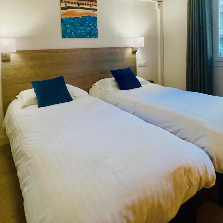 Hotel Courbet - Chambre Lits Jumeaux Économique - 1