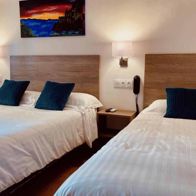 Hotel Courbet - Chambre Quadruple Économique - 3