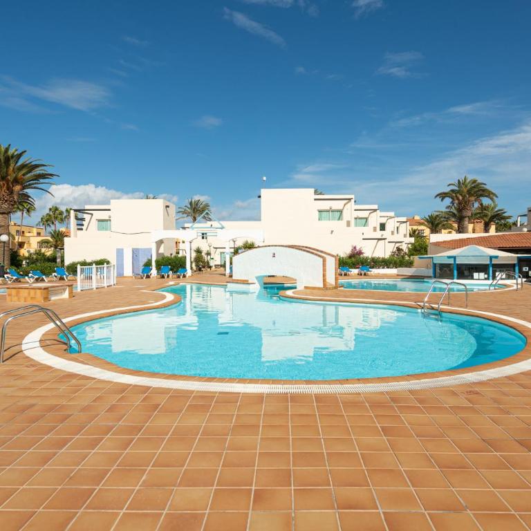 HomeForGuest Apartamento 15 con terraza y piscina en Corralejo - Apartamento - 28