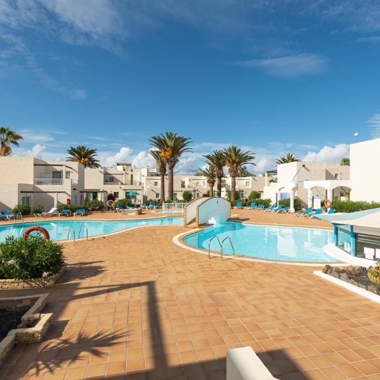 HomeForGuest Apartamento 15 con terraza y piscina en Corralejo - Apartamento - 24