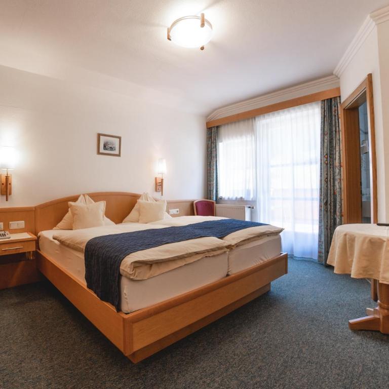 Hotel Landhaus Neumayr - Comfort Dreibettzimmer - 1