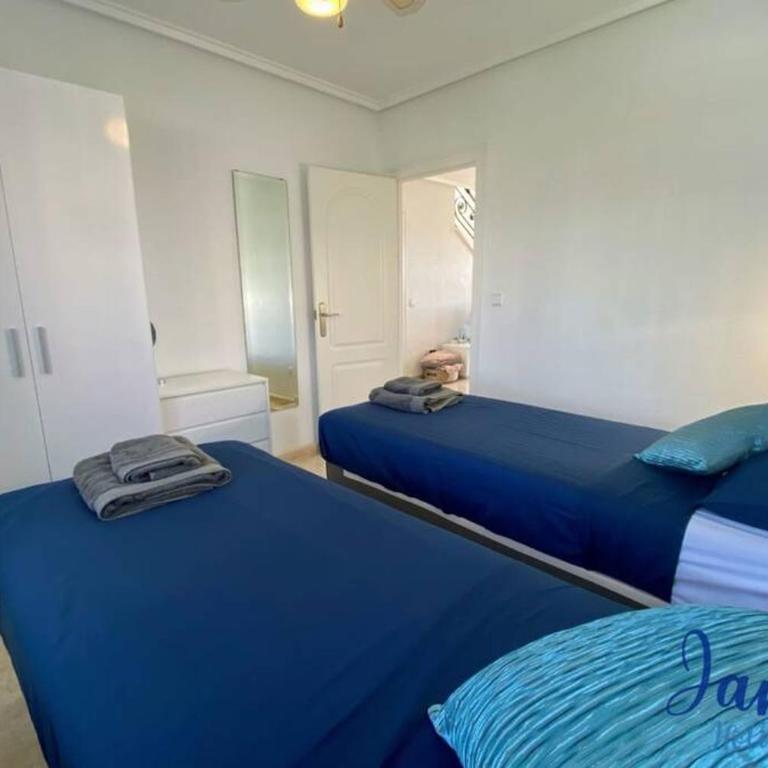 Laguna Townhouse overlooking Communal Pool LOM01 - Three-Bedroom House - 33