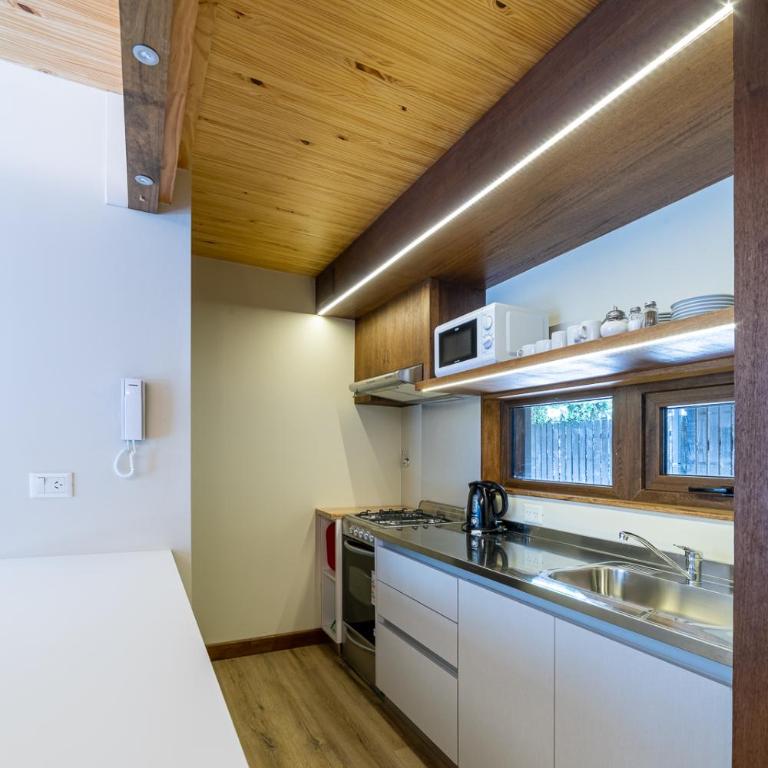 Departamento de 1 ambiente, Edificio Viveros 2, centro San Martín de los Andes con patio - Apartamento Estudio - 16