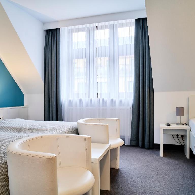 Brunnenhof City Center - Chambre Triple - Côté Cour - 1