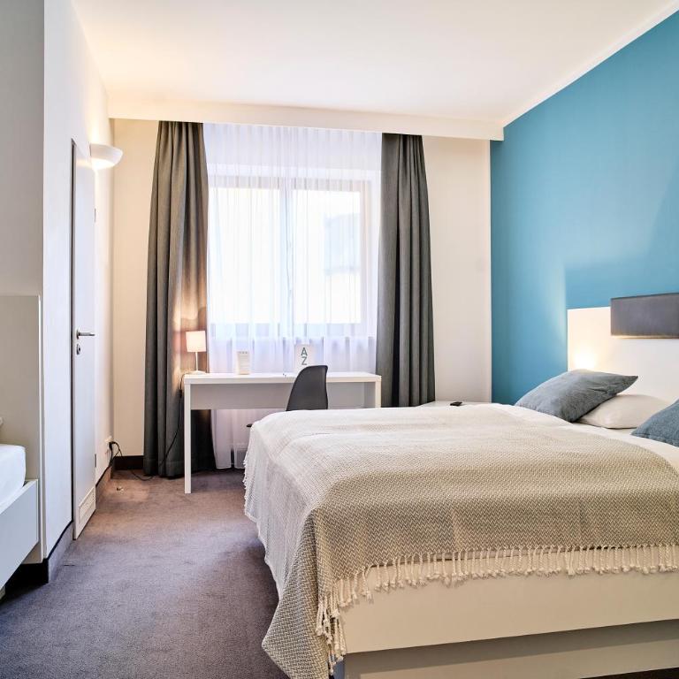 Brunnenhof City Center - Chambre Triple - Côté Cour - 2