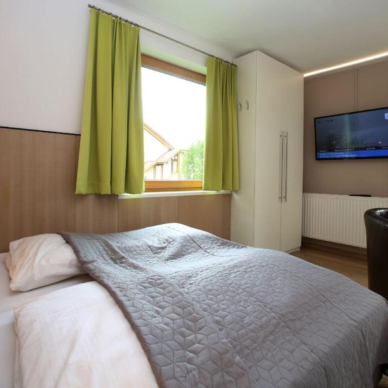 Annika Apartments summer card included - Apartment mit 2 Schlafzimmern und Balkon oder Terrasse - 32