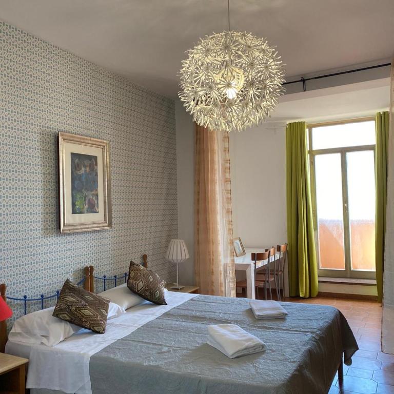 Milazzo Luxury Home roma - Camera Quadrupla con Balcone - 5