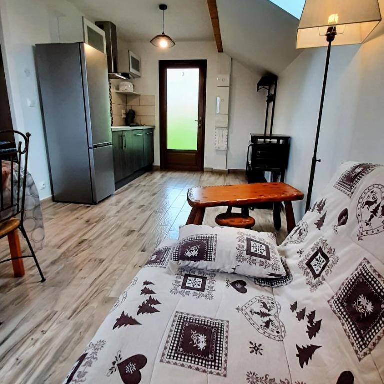 Le Pré Fleuri à Guillestre - Appartements neufs classés Meublés de Tourisme 3 étoiles- Climatisés- Parking privatif - Appartement à l'étage Une Chambre - 1